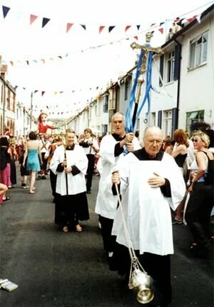 The parade leaves the church after the service